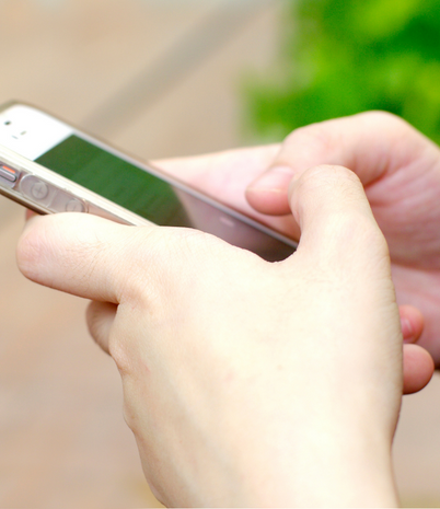 Hands holding a smartphone
