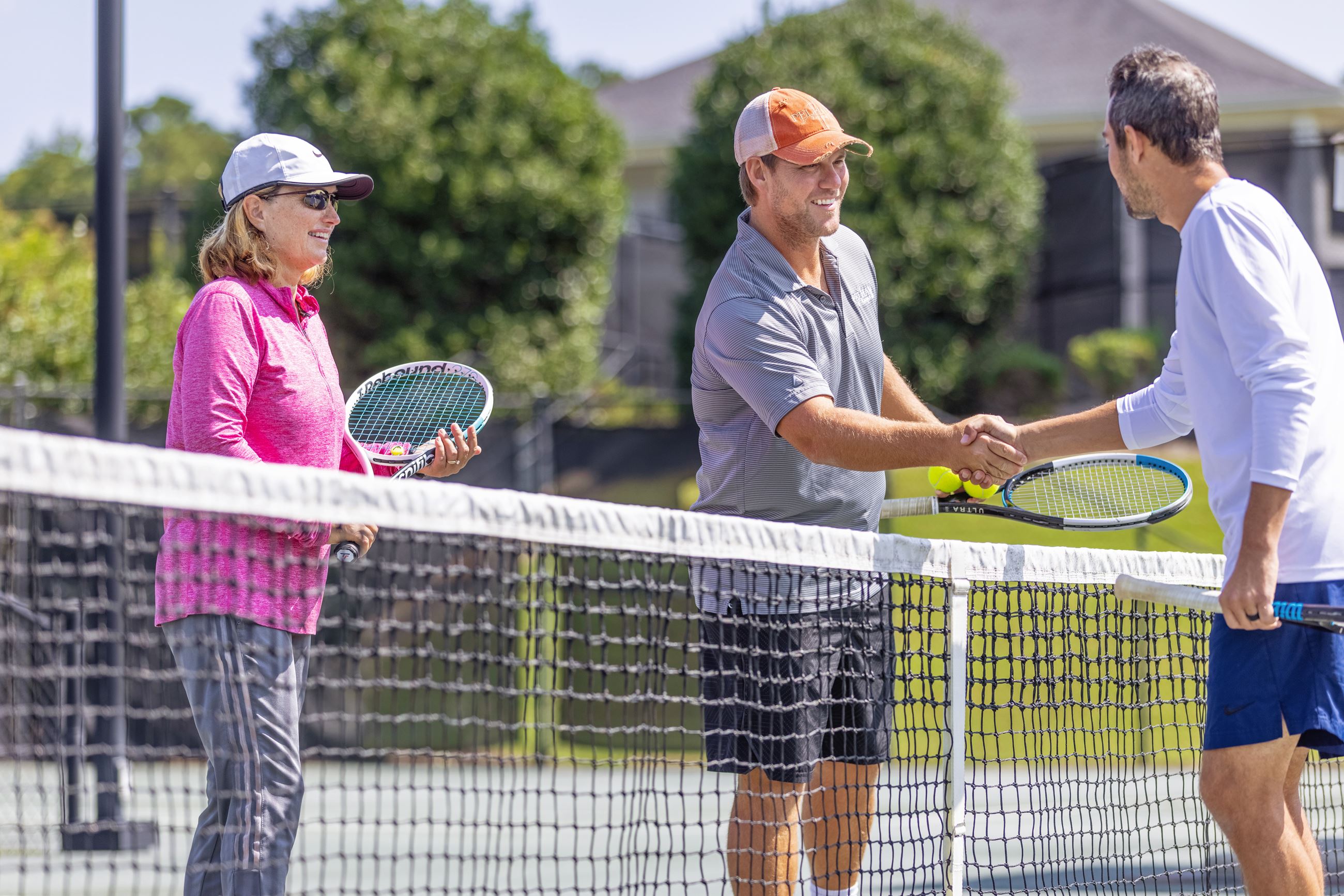 Tennis pros shaking hands