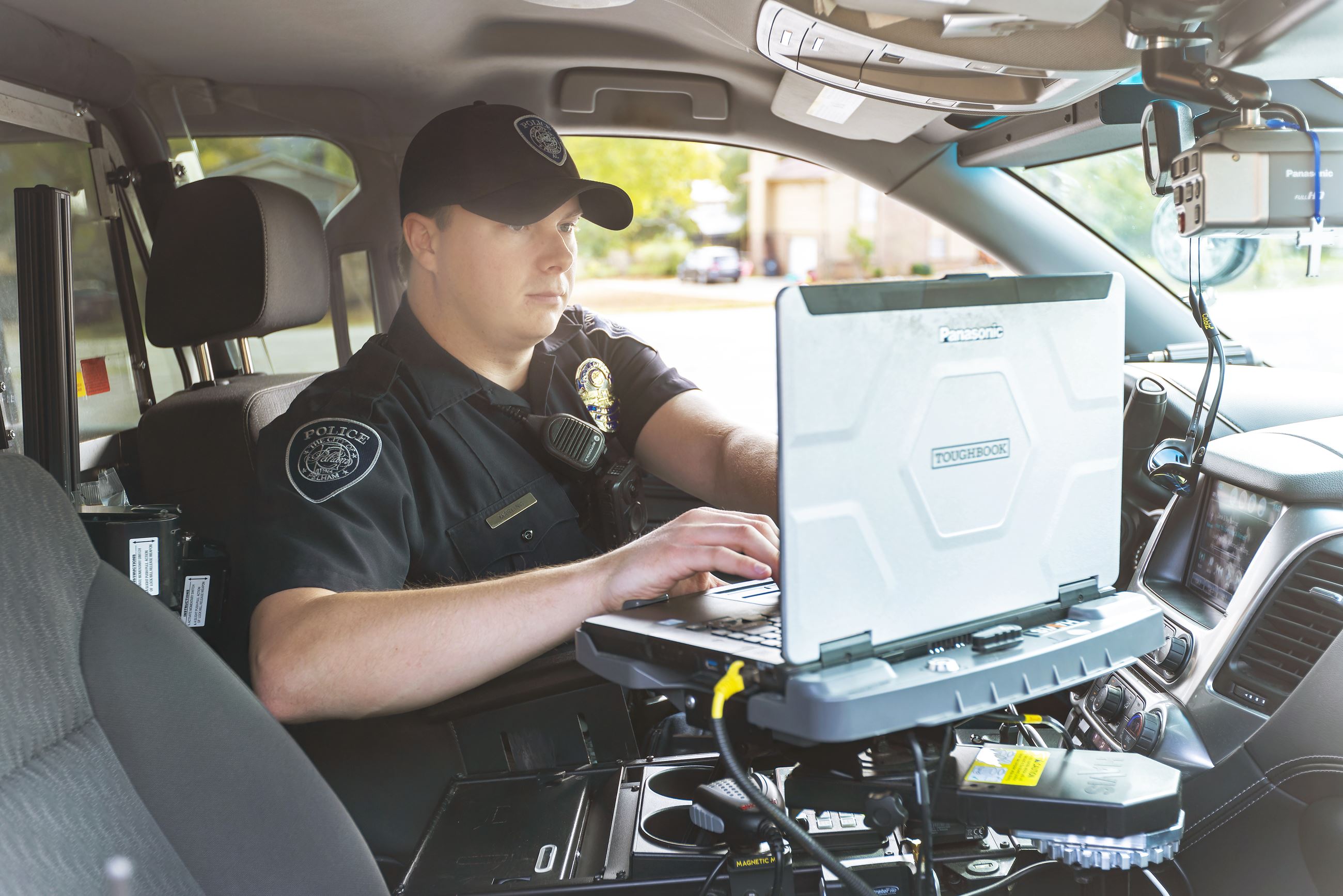 Officer in a patrol vehicle